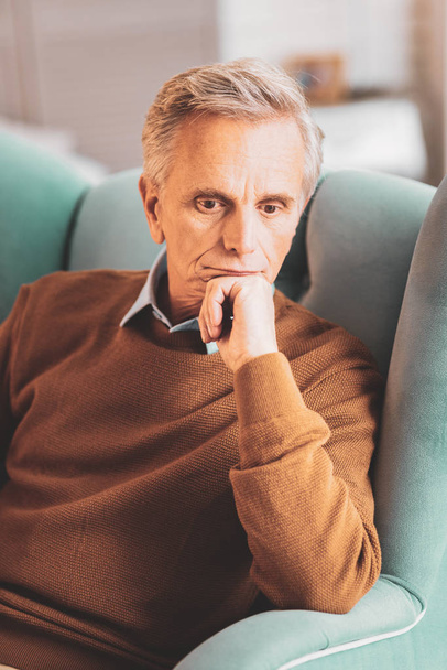 Aged introspective man feeling thoughtful - Fotoğraf, Görsel