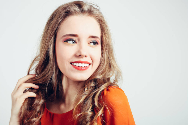 Young girl with beautiful makeup on neutral background. - Valokuva, kuva