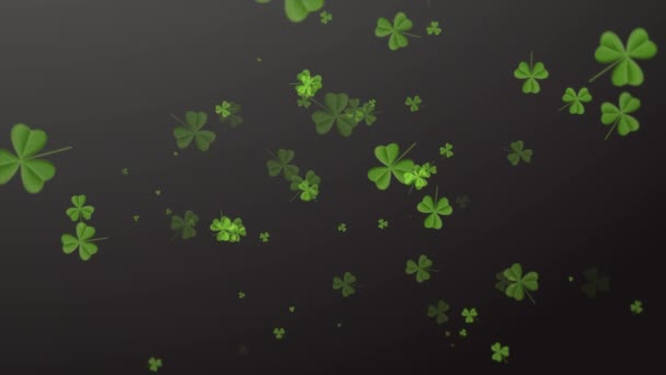 Tag des Heiligen Patricks. Fallende Kleeblätter auf schwarzem Hintergrund - Filmmaterial, Video
