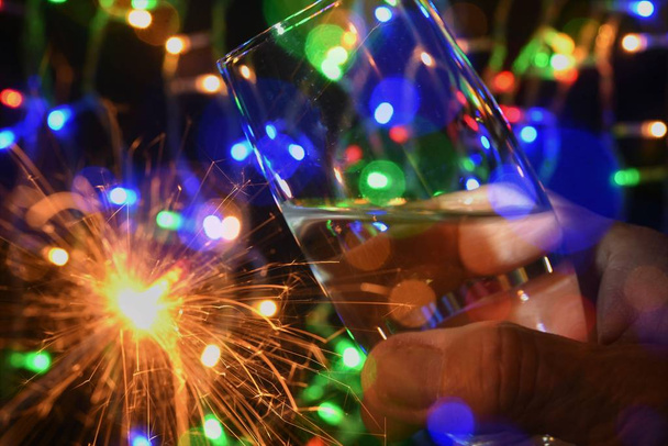νέου έτους γιορτάζουν με χρώμα σπίθα φωτός και πυροτέχνημα - Φωτογραφία, εικόνα