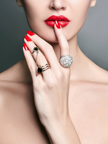 beautiful young woman with jewelry rings. beauty girl with make-up and manicure - Fotografie, Obrázek