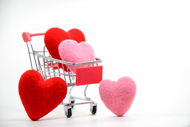 Hearts in shopping cart isolated on white background,Valentine day. - Фото, изображение