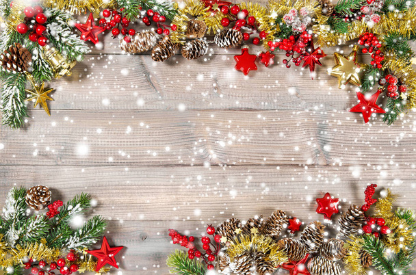 Christmas ornaments, stars, garland, decorations with falling snow effect - Fotografie, Obrázek