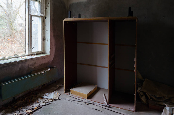 Room in 9-storey apartment building in dead abandoned ghost town Pripyat, Chernobyl NPP alienation zone, Ukraine - Фото, изображение