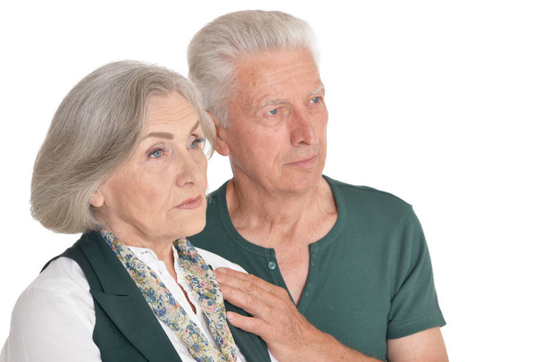 Portrait of thinking  senior couple isolated on white background - Фото, изображение
