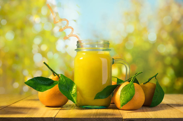tangerine juice with fruits - Fotoğraf, Görsel