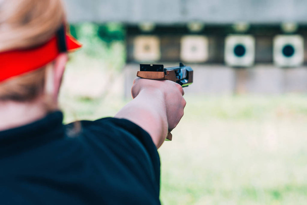 Woman on sport shooting training shooting target - Fotografie, Obrázek