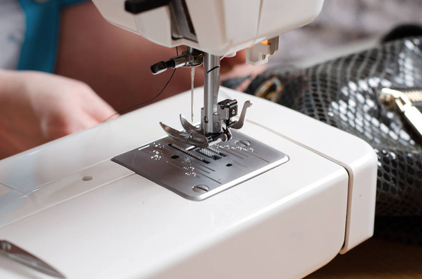 Accessory for sewing. Sewing machine close up - Foto, Bild