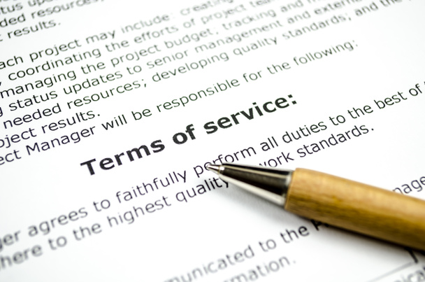 Terms of service with wooden pen - Photo, Image
