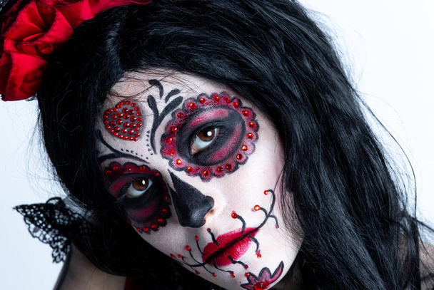 Make-up model with theme Mexican Day of the Dead in a study session in madrid, spain - Фото, зображення