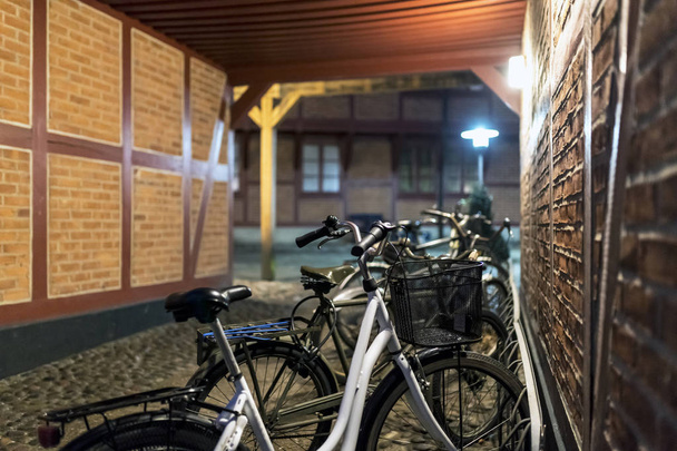 Rental bikes on Ystad street, south Sweeden, Skane County. - Photo, Image