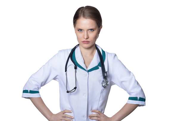 Portrait of  female doctor posing on white - Photo, image