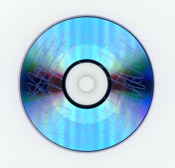 Γδαρμένο Dvd. πολλαπλές συνεδρίες είναι ορατά. Μπλε χρωστική ουσία. - Φωτογραφία, εικόνα
