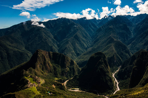 Putucusi and Urubamba River as seen from Machu Picchu Mountain - Foto, afbeelding