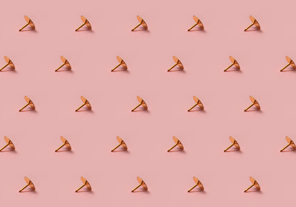 Golden tack pattern on pink background - Фото, зображення