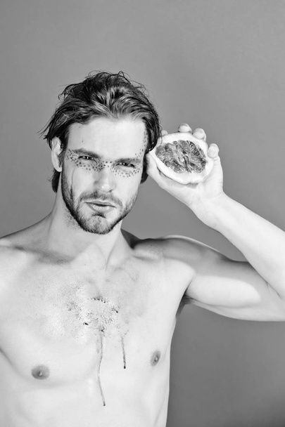 guy with creative fashionable makeup hold grapefruit, vitamin - Valokuva, kuva