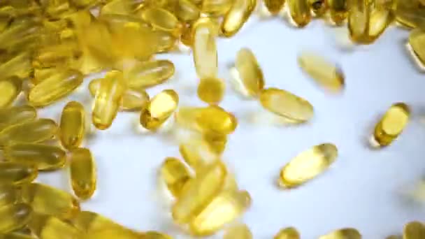 Filmación de aceite de pescado en pastillas
 - Imágenes, Vídeo
