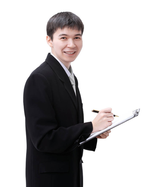 successful young businessman with documents.isolated on white. - Фото, зображення