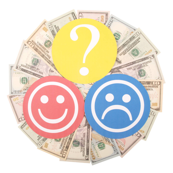 signo de interrogación entre sonriente y triste sonriente en mandala caleidoscopio de dinero. Concepto del nivel de ingresos de hombres y mujeres
 - Foto, Imagen