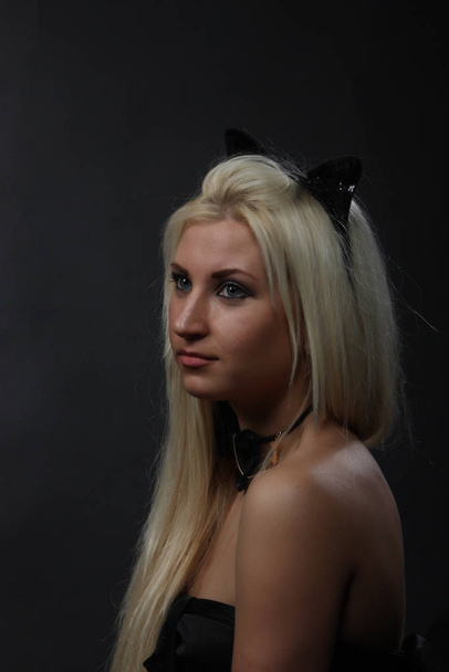Sexy girl with a cat  ears posing  - Fotografie, Obrázek