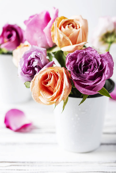 Beautiful bunches of pink roses on white background - Фото, изображение