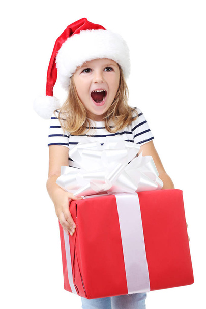 Happy girl holding gift box on white background - Photo, Image