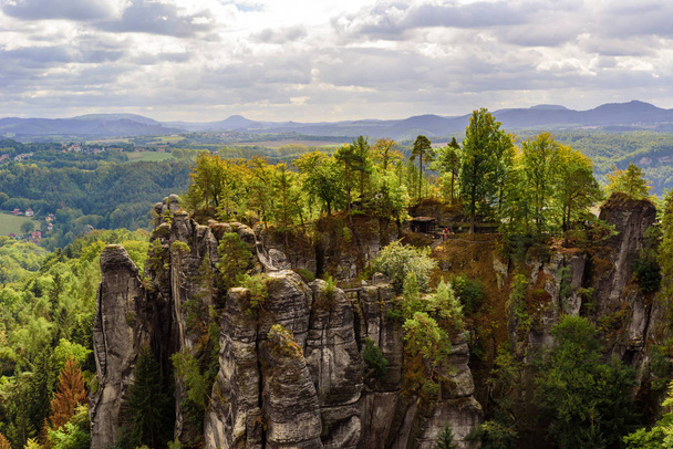 Panorama view on the beautiful rock formation of Bastei in Saxon Switzerland National Park, near Dresden and Rathen - Germany. Popular travel destination in Saxony. - Photo, image