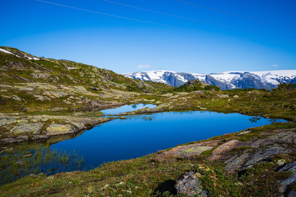 beautiful landscape of Norwegian mountains on track to Trolltunga - 写真・画像