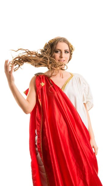 Ancient  goddess  in a red greece toga isolated on a white background - Фото, изображение