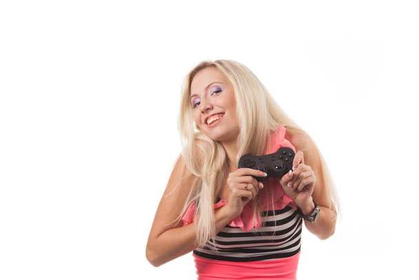 Young woman playing  video game - 写真・画像