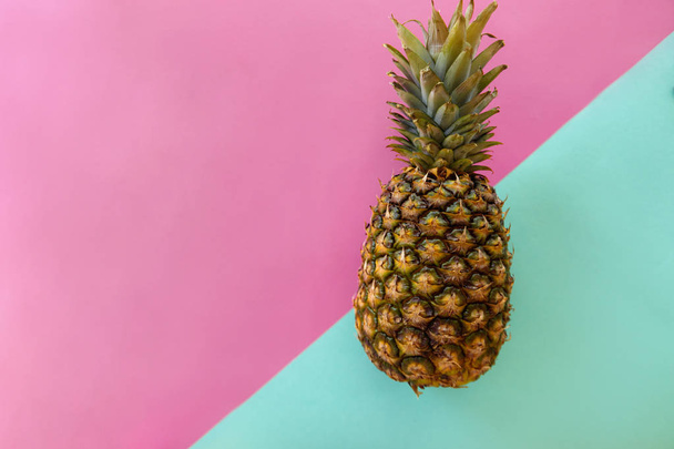 Pineapple On Blue And Pink Background - Foto, afbeelding