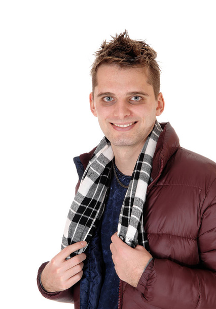 Portrait of a young smiling man in leather jacket - Фото, зображення