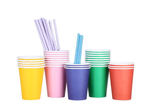 Colorful paper cups with straws isolated on white background - Фото, изображение
