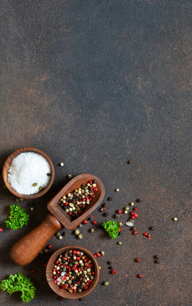 A variety of spices on a concrete background. Salt. Pepper.  - Photo, Image