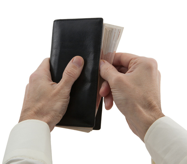 man's handen portemonnee met biljet verbergen - Foto, afbeelding