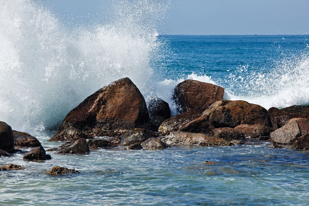 Waves breaking against the rocks - Fotó, kép