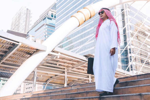 Arab businessman holding bag successful - Photo, Image