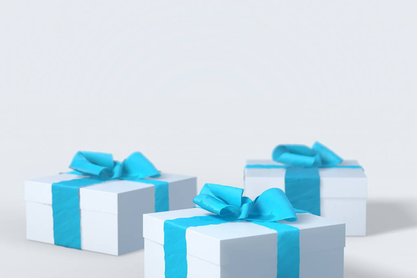 2018 Christmas New Year white gift boxes with blue bows of ribbons isolated on the white background. 3d illustration with copyspace for your text. Selective focus macro shot with shallow DOF - Foto, afbeelding