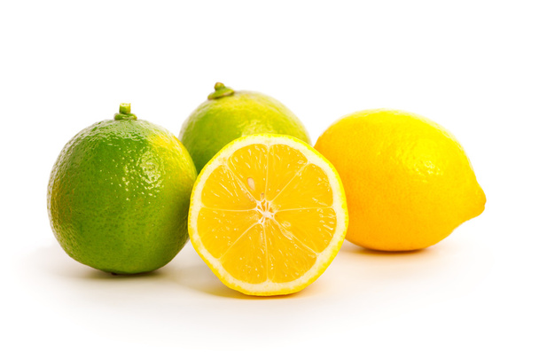 yellow and green lemon over white background. - Foto, immagini