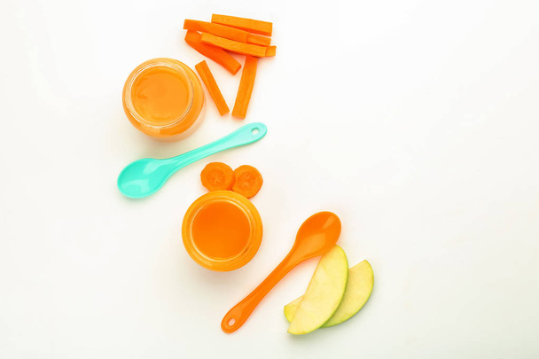 Flat lay composition with healthy baby food on white background - Foto, Imagem
