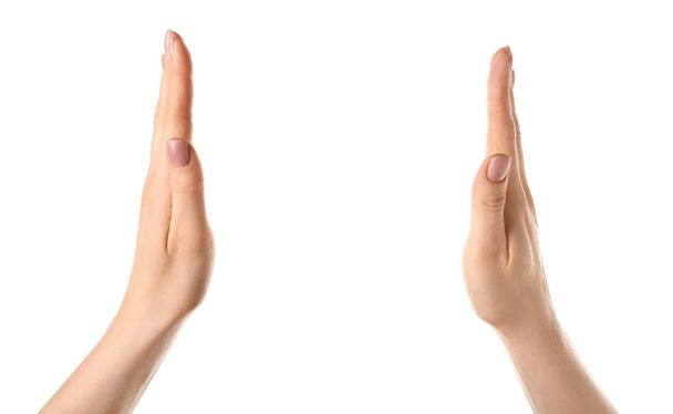 Female hands holding something on white background - Photo, Image