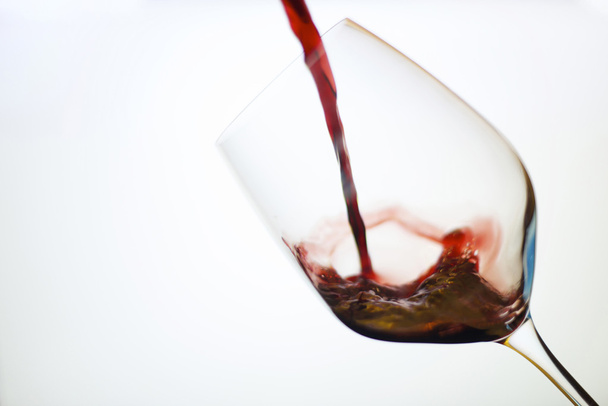 Pouring red wine in glass - Zdjęcie, obraz
