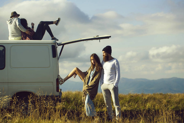 Young couples travel by minibus - Fotografie, Obrázek