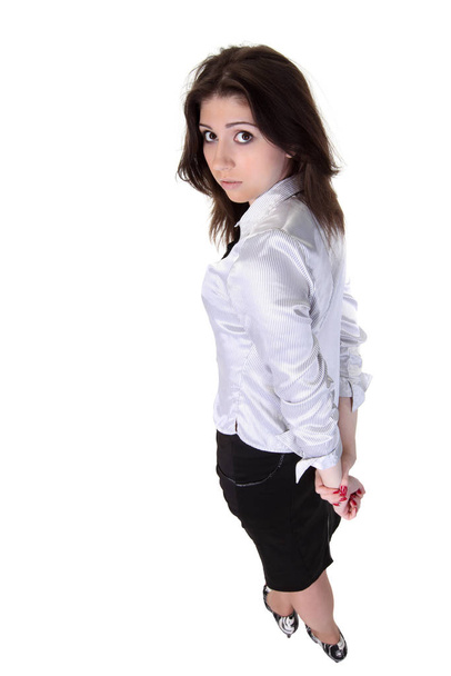 Shy young businesswoman. Wide angle. - Foto, imagen