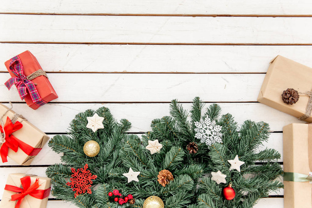 Christmas presents and boxes on wooden background - Valokuva, kuva