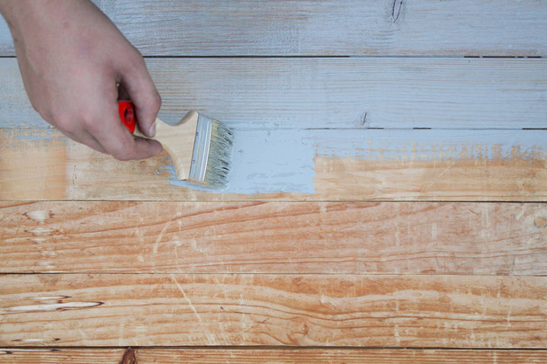 paint the old wooden floor with gray brush. background - Φωτογραφία, εικόνα