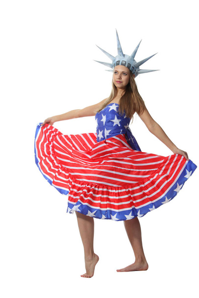Attractive blond woman in costume Statue of Liberty - Фото, изображение