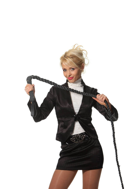 Young businesswoman holding  a leash - Foto, imagen