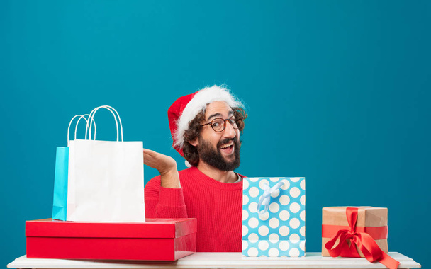 Young man with gifts. Christmas concept. - Foto, Imagen