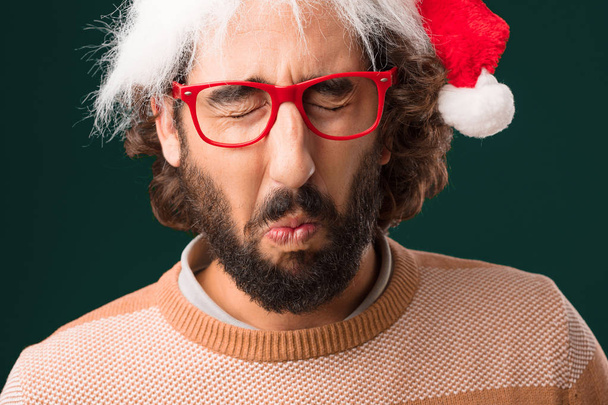 young crazy man with Christmas concept - Foto, imagen